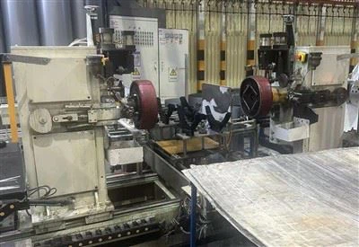 Mașină de încadrare cu două capete